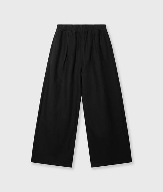 PANTALONES fluidos de lino