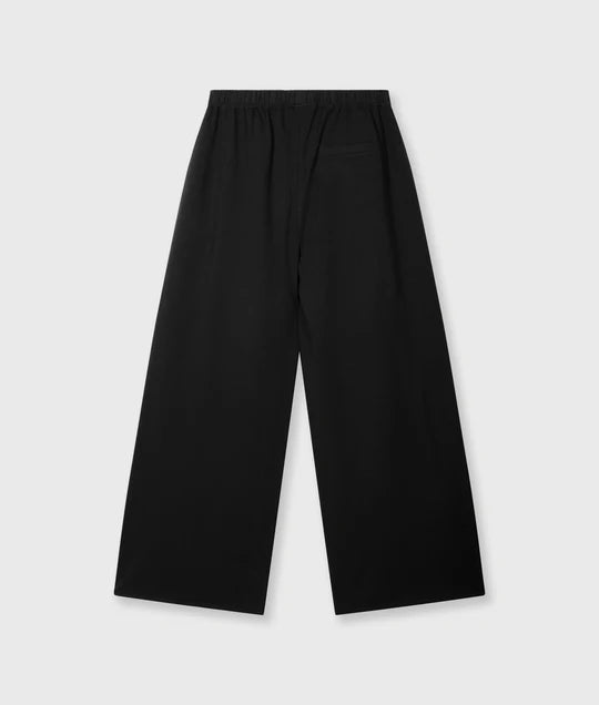 PANTALONES fluidos de lino