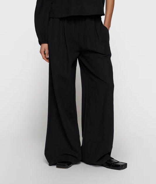 PANTALONES fluidos de lino