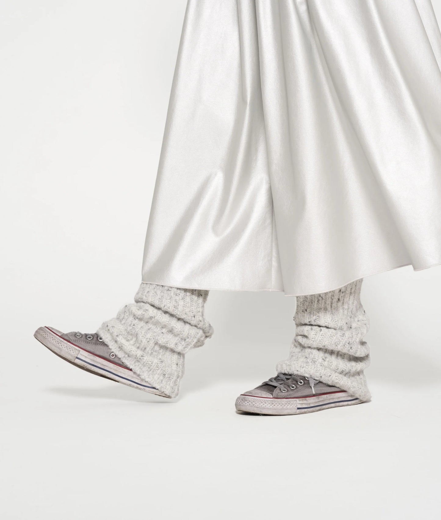 FALDA PLISADA EFECTO CUERO